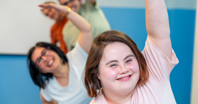 A special olympics athlete and volunteers