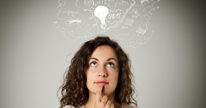 A woman with ideas swirling around above her head