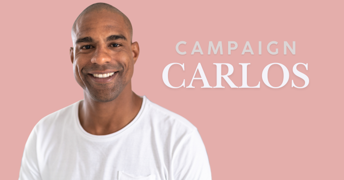 A dimpled man with a big smile and the label 